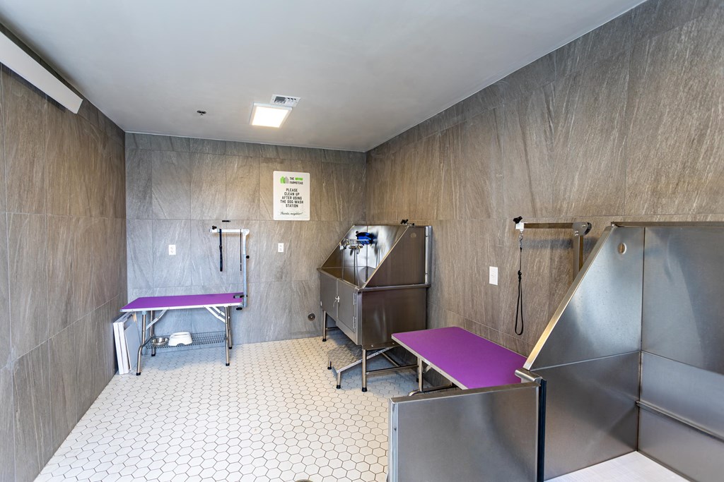 a treatment room with two tables and a refrigerator  at The Farmstead, Vancouver, WA 98684