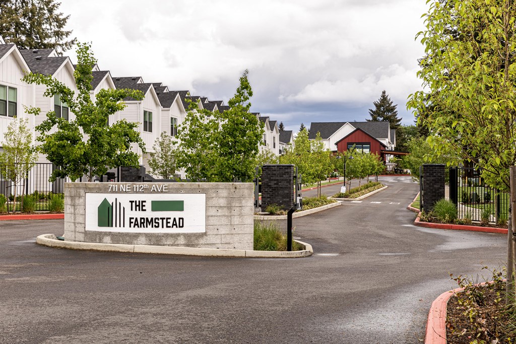 the fanned out sign at the entrance to the fairfield apartments at The Farmstead, Washington