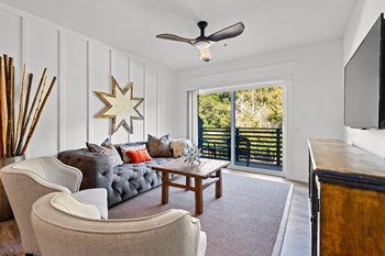 River Mill Lofts Living Room Living Room with sofa, table and two accent chairs - Photo Gallery 6