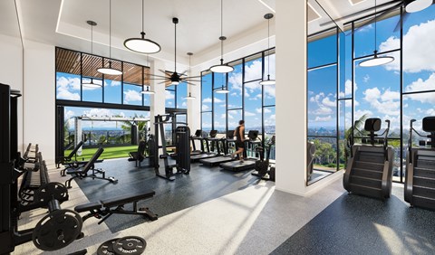 A gym with a view of the ocean.