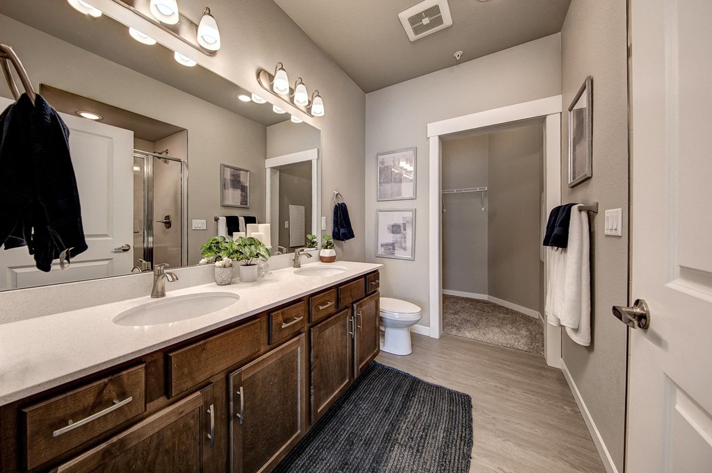 Pelican primary bathroom with dual sink vanity
