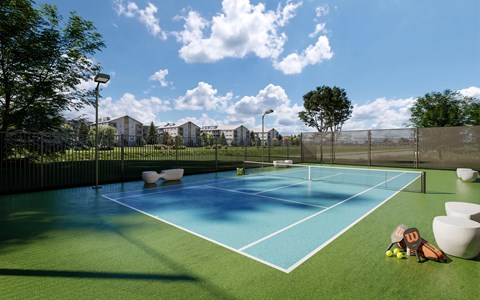 A tennis court with a blue surface and white lines, surrounded by a fence and trees.