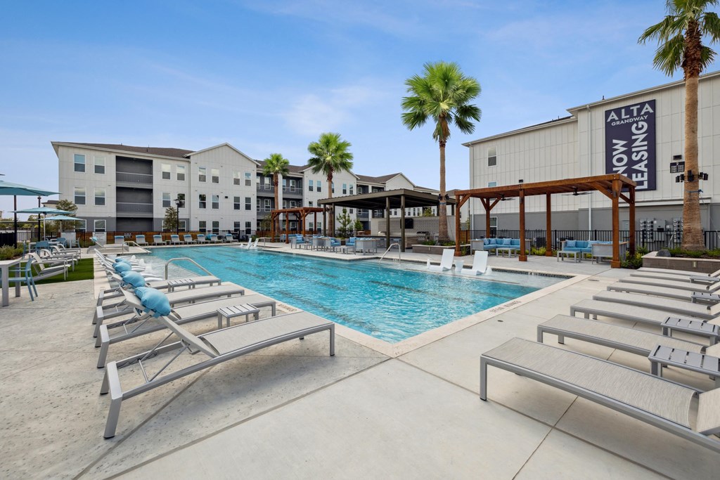 our apartments have a large pool and lounge chairs