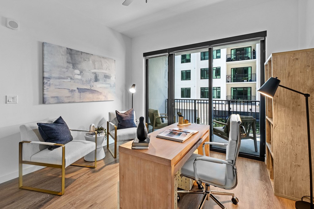A modern home office with a view of the city.