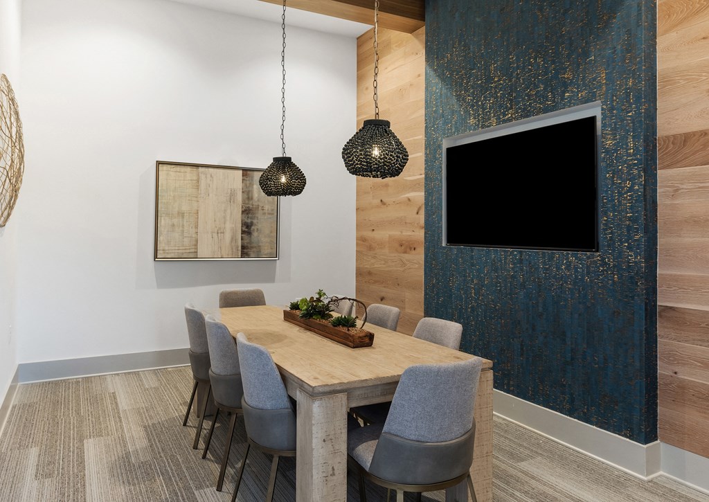 conference room with table and technology