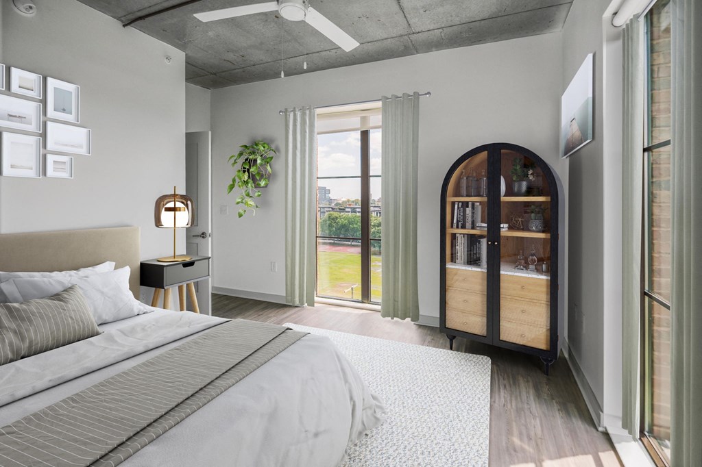 a bedroom with a bed and a bookshelf