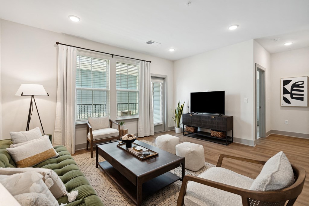 a living room with a couch and a tv