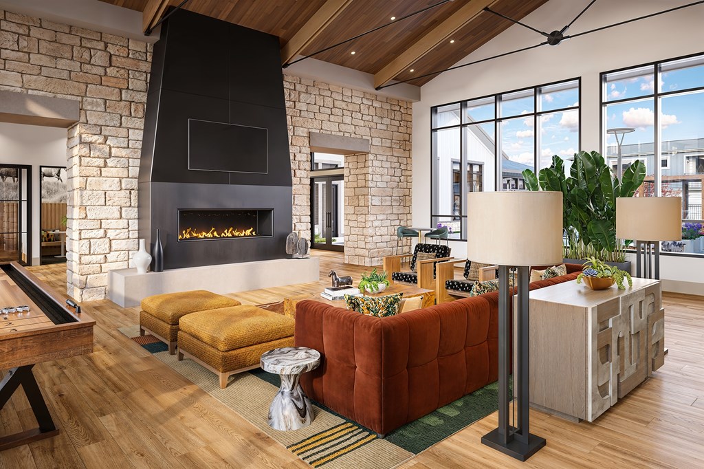 Clubhouse with a fireplace at Firestone Junction new apartments in Firestone, CO