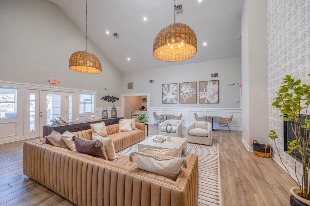 club house with couches and chairs and a table