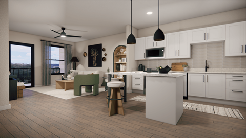 A modern kitchen with white cabinets and a wooden floor.