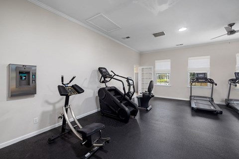 the fitness center with workout machines