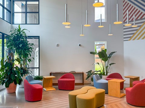 A room with a white wall and a striped pattern on the right side.