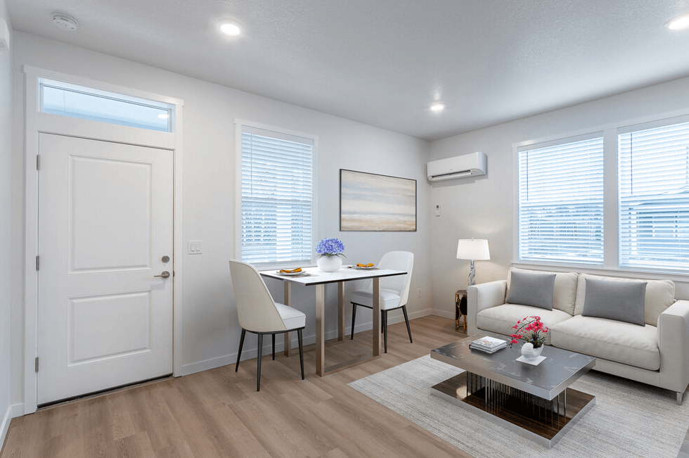 a living room with a couch and a table