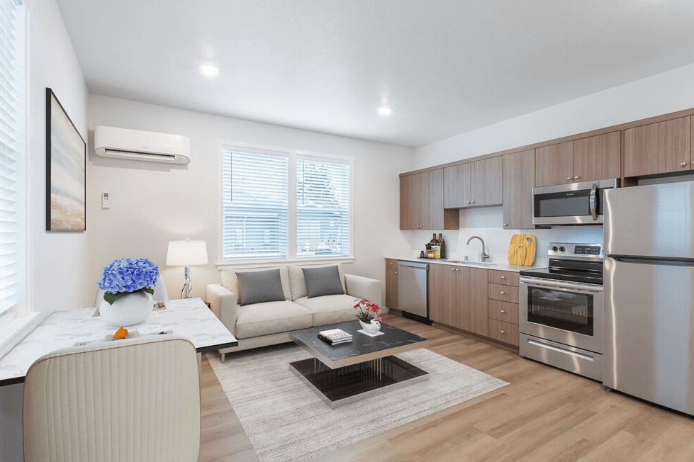 a living room with a couch and a table