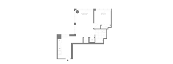 A floor plan of a house with a living room, dining room, and kitchen.
