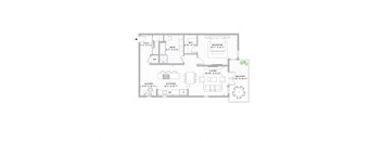 A floor plan of a house with a garage, living room, kitchen, and two bedrooms.