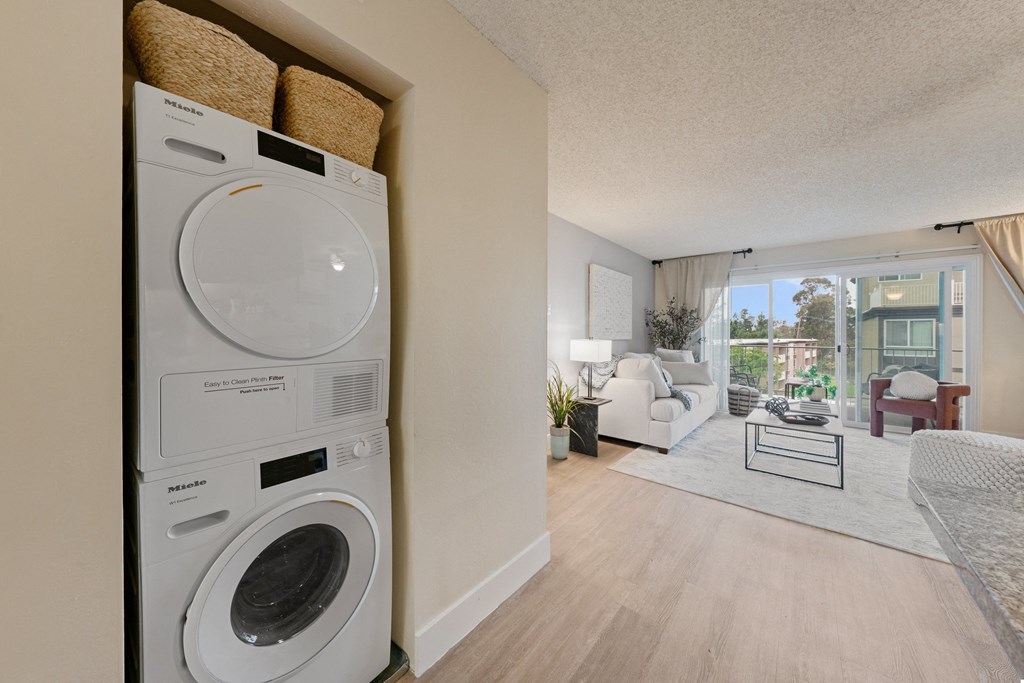 a washer and dryer in a living room