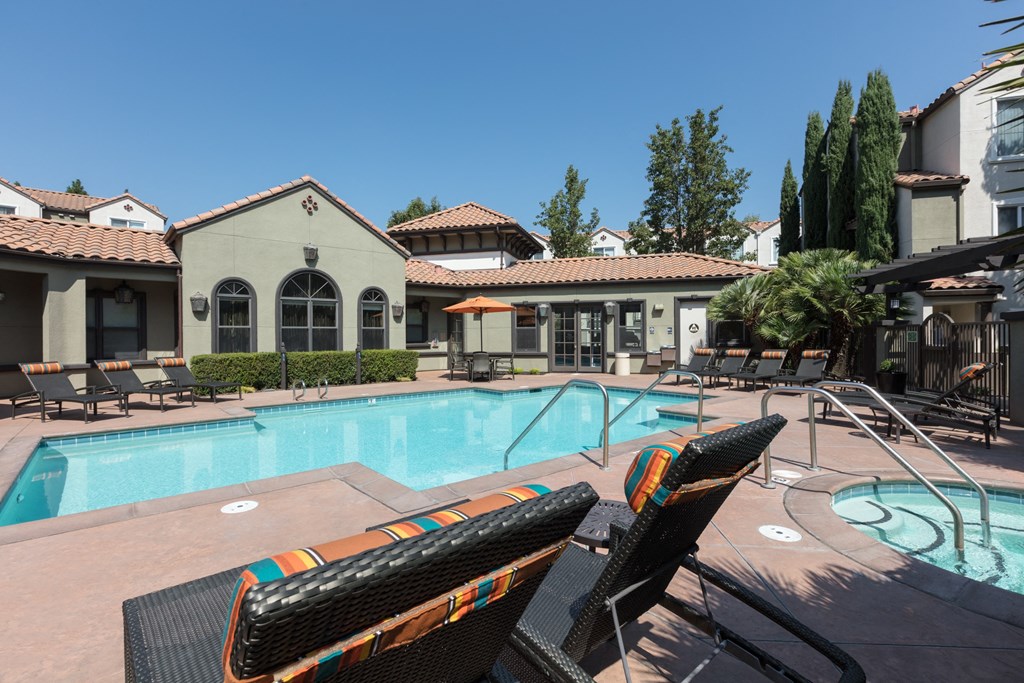 swimming pool and lounge chairs