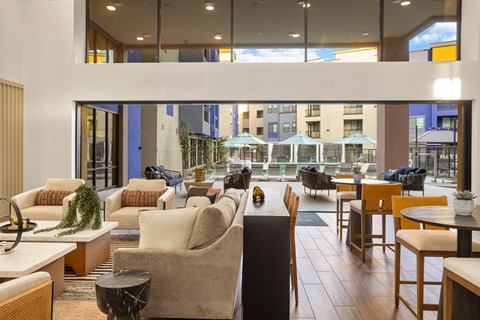 A large room with a lot of chairs and tables.