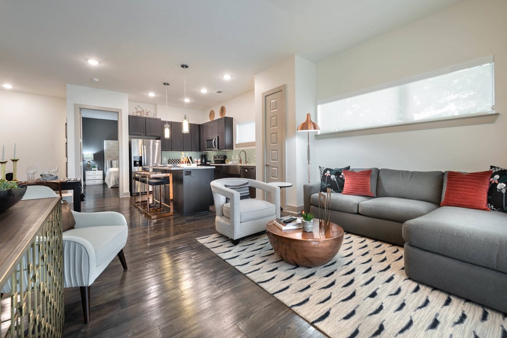 a living room with a couch and a table