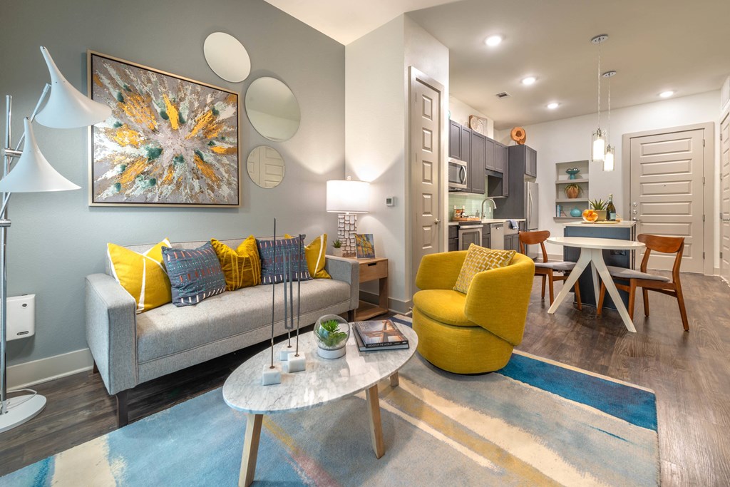 a living room with a couch and a table