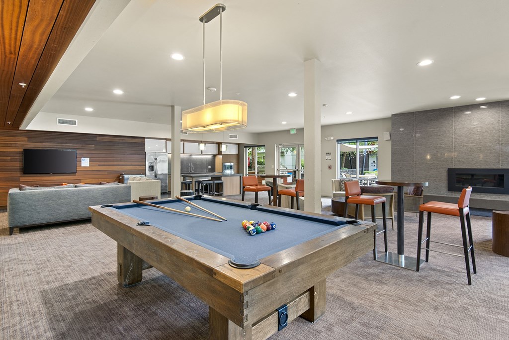 our apartments have a clubhouse with a pool table and a flat screen tv our apartments have a clubhouse with a pool table and a flat screen tv at Allez, Redmond, WA