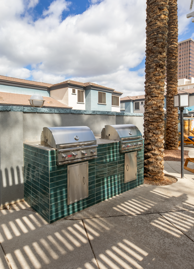 two bbq grills at the enclave at woodbridge apartments in sugar land, tx
