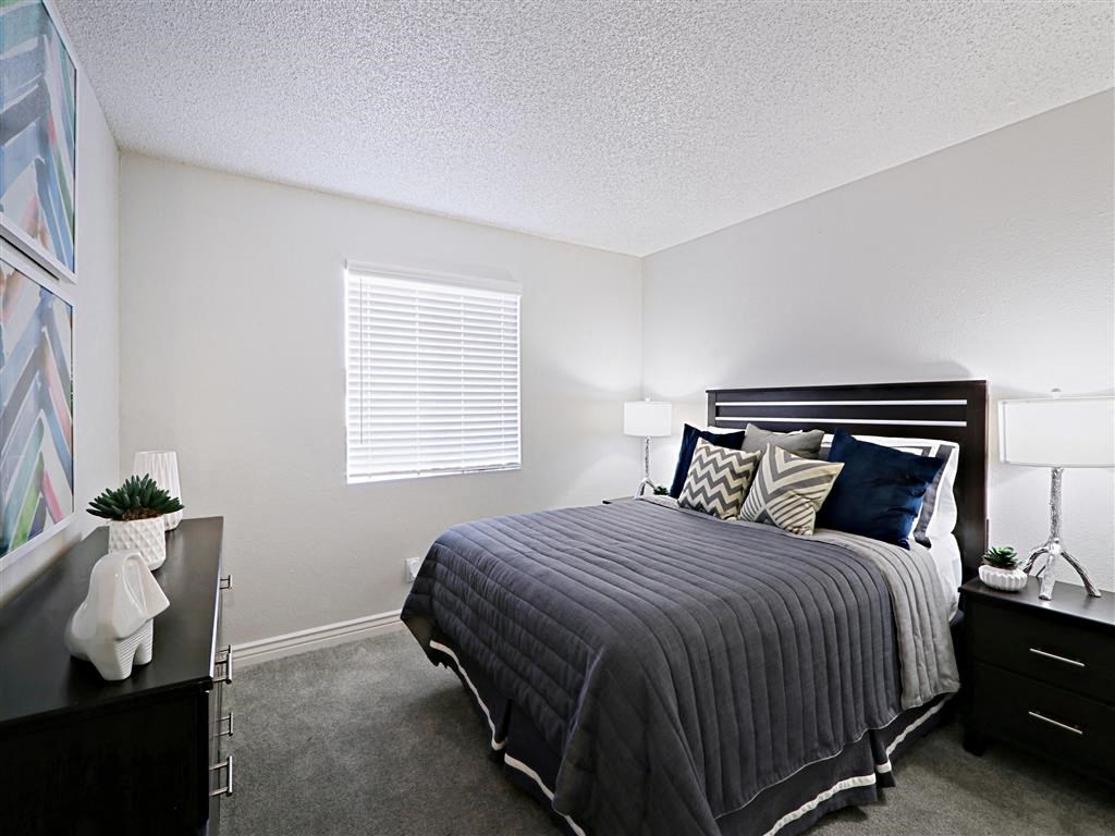 Spacious Bedroom With Comfortable Bed at Villatree Apartments, Tempe, Arizona