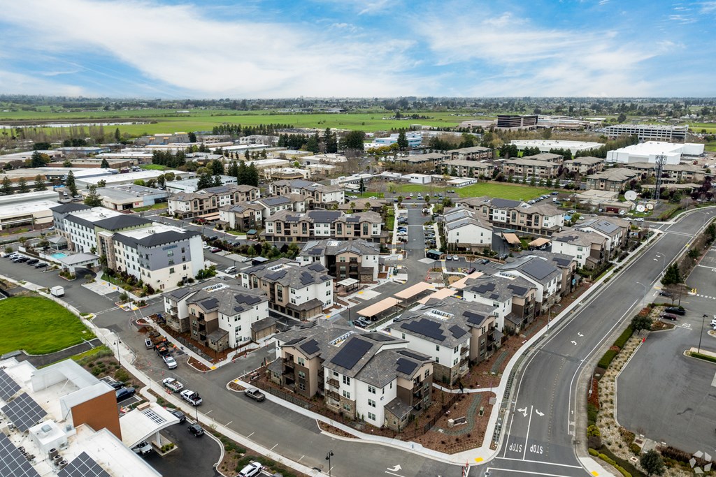an aerial view of a suburb of a city with houses
