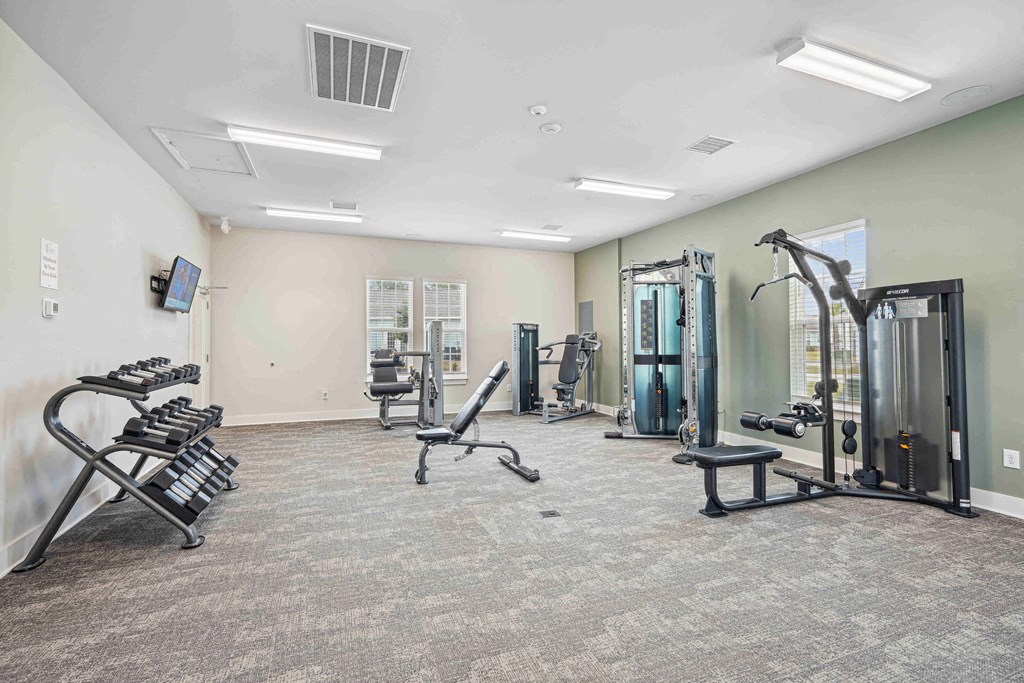 the gym in our apartments is equipped with cardio equipment and weights