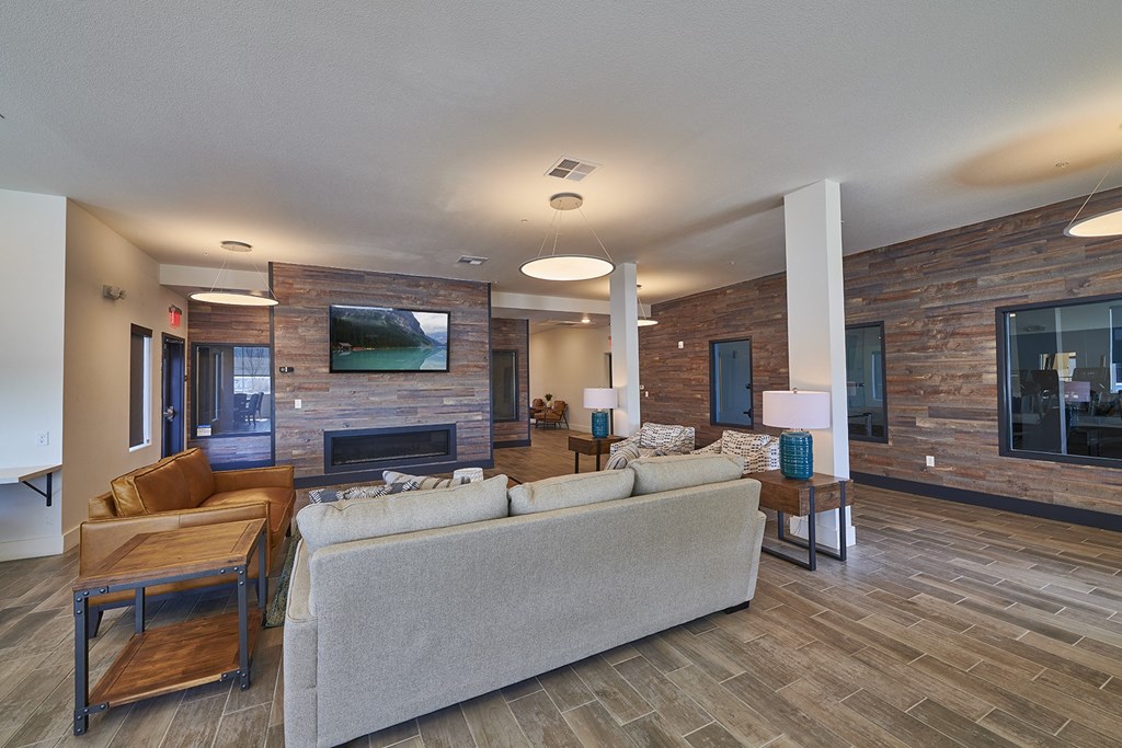 Clubhouse seating area in front of  TV and fire place  at Alpine Vista, Colorado Springs, CO
