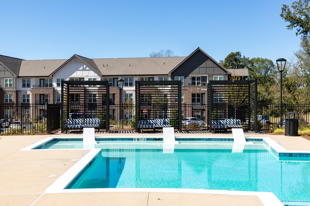 the swimming pool at the falls at rolland park apartments