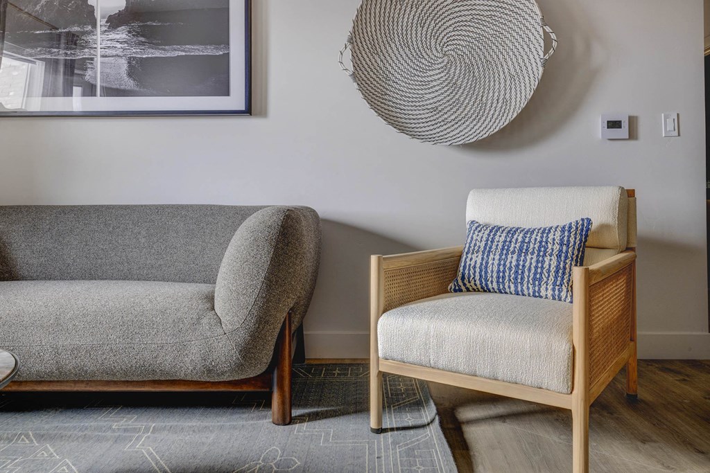 two chairs sitting next to each other in a living room