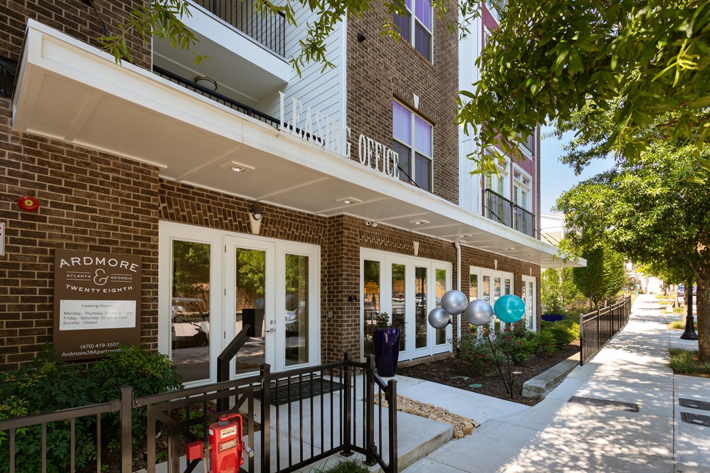 A brick building with a sign that says "Ardmore" on it.
