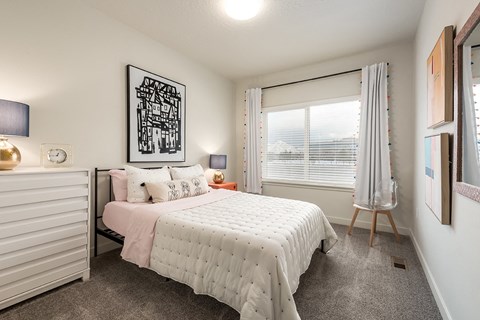 Bedroom with a bed at H2O Townhomes, West Valley City, Utah