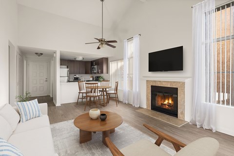 A living room with a fireplace and a television.