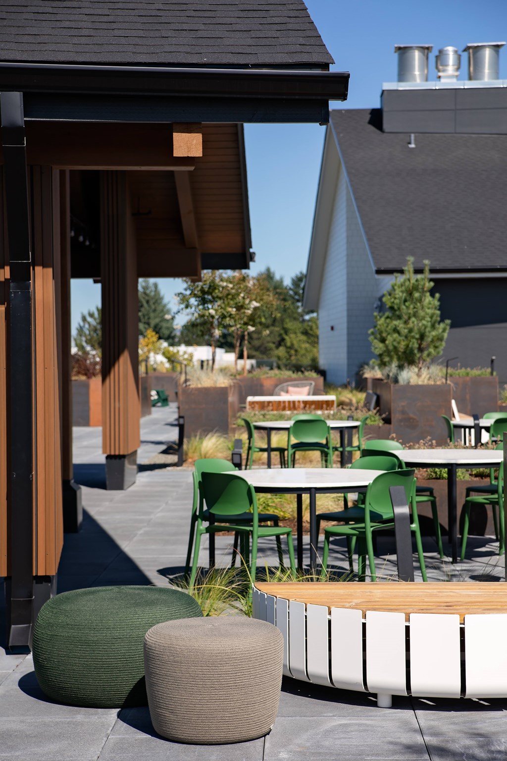 A patio with a table and chairs.