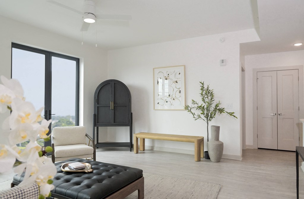 a living room with an and a black door