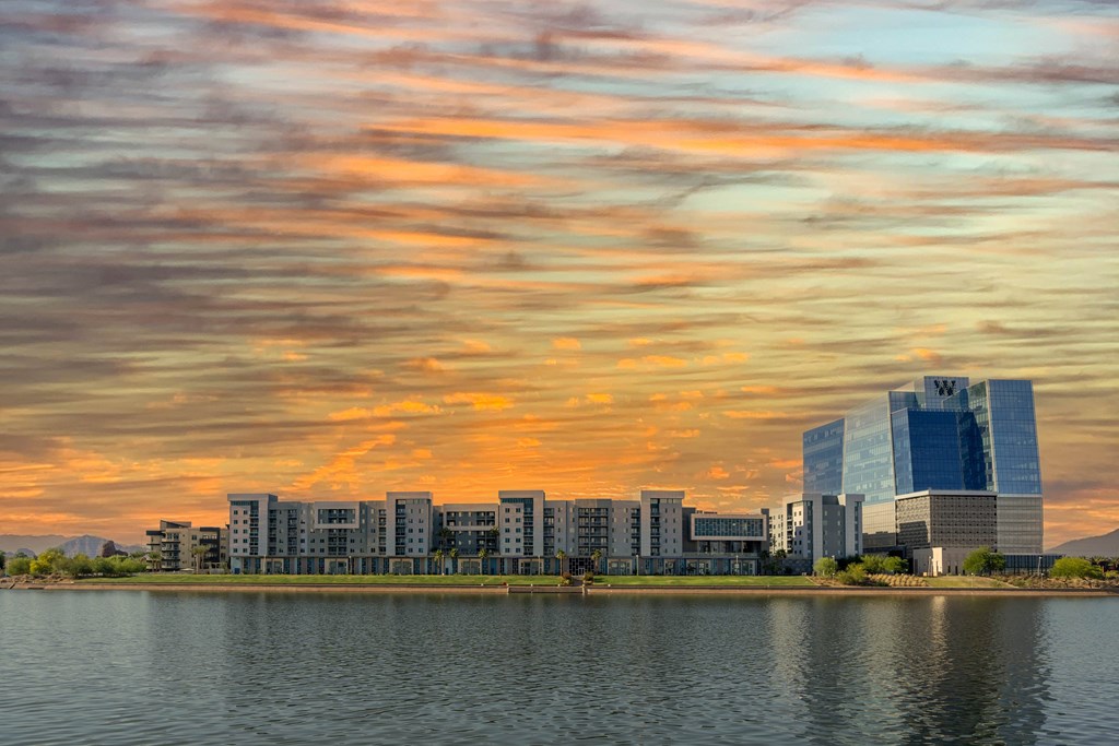 a city with a lake in front of it