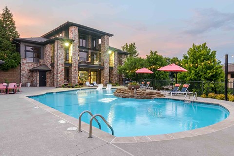 Resort style pool at Aventura Falcon Valley apartments for rent in Lenexa, KS.
