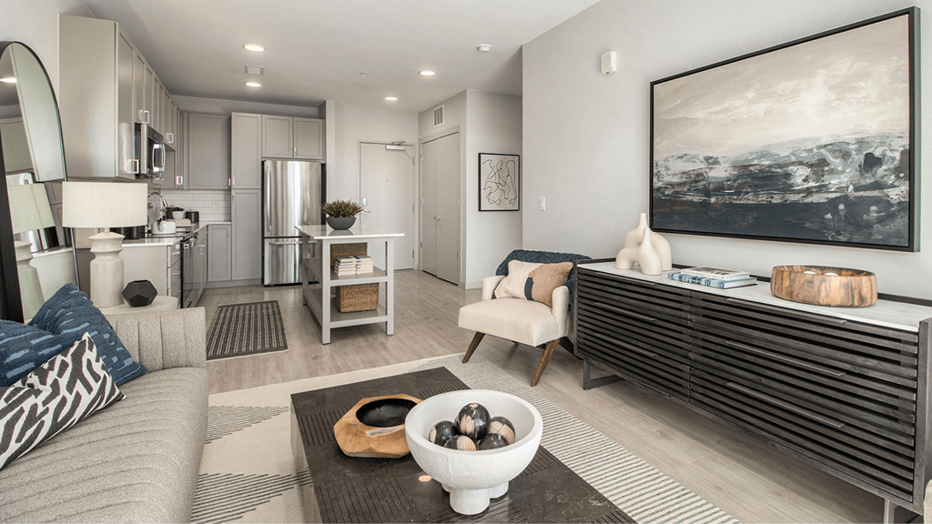 a living room with a couch and a table