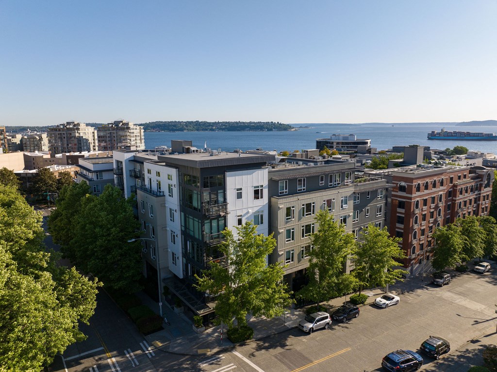 a view of a city street with a body of water in the background  at Axis, Washington