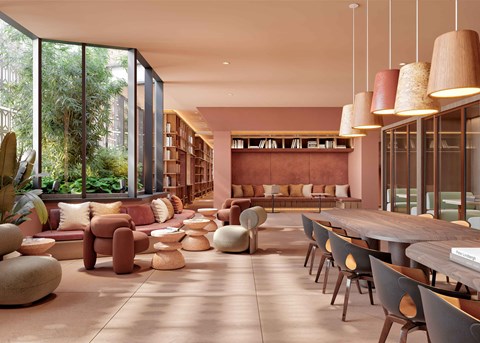 A modern living room with a long table and chairs.