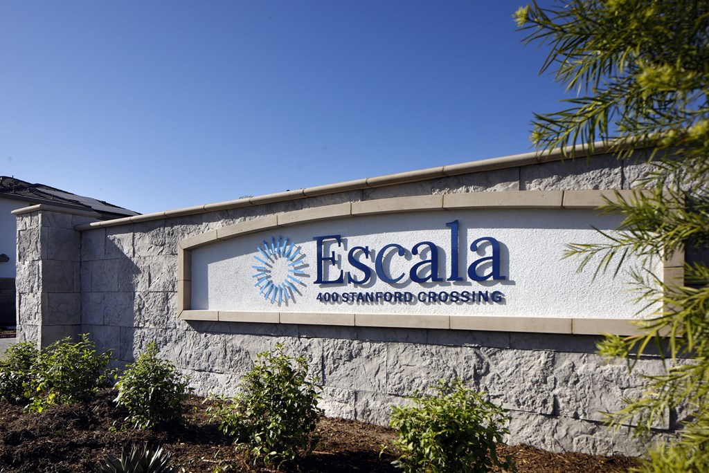 A sign for Escala Drywall in Sanford, Florida.
