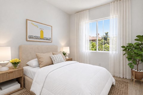 A bedroom with a large bed, a painting on the wall, and a potted plant.