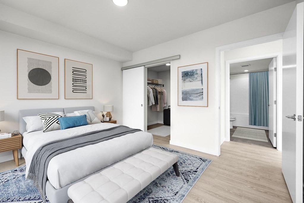 a bedroom with a bed and a mirror at Ion Town Center, Shoreline, WA 98133