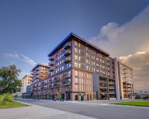 a rendering of a building with a blue roof