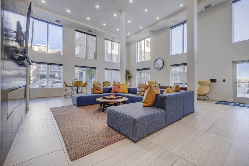 a living room with a couch and a table