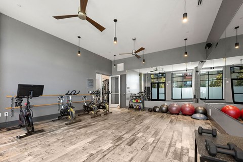 the gym at the flats at big tex apartments