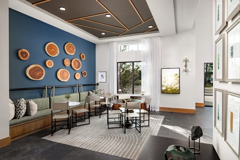 Modern clubroom at Elan Brookwood with seating